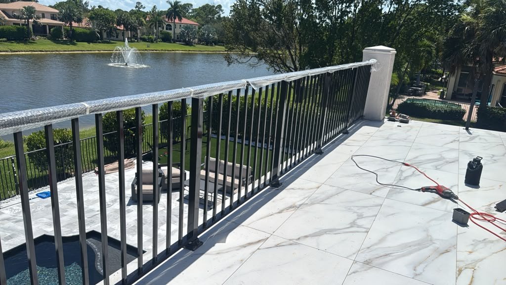 Welded aluminum railing on a waterfront balcony